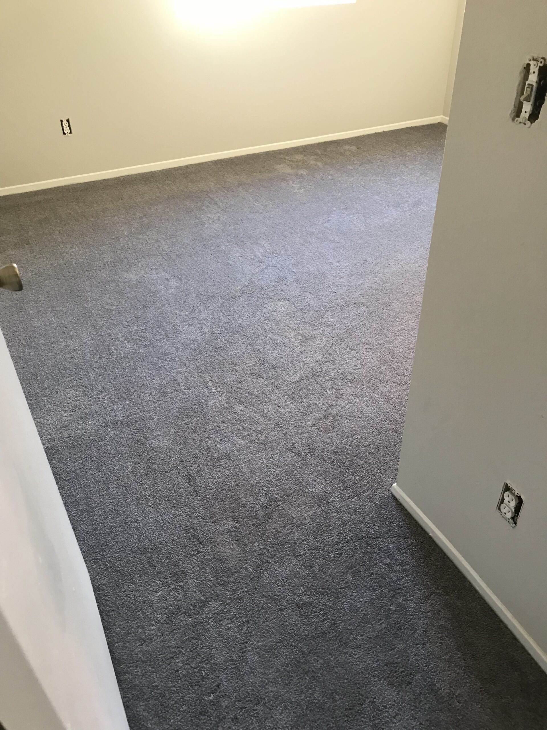 Grey Carpet Installation.