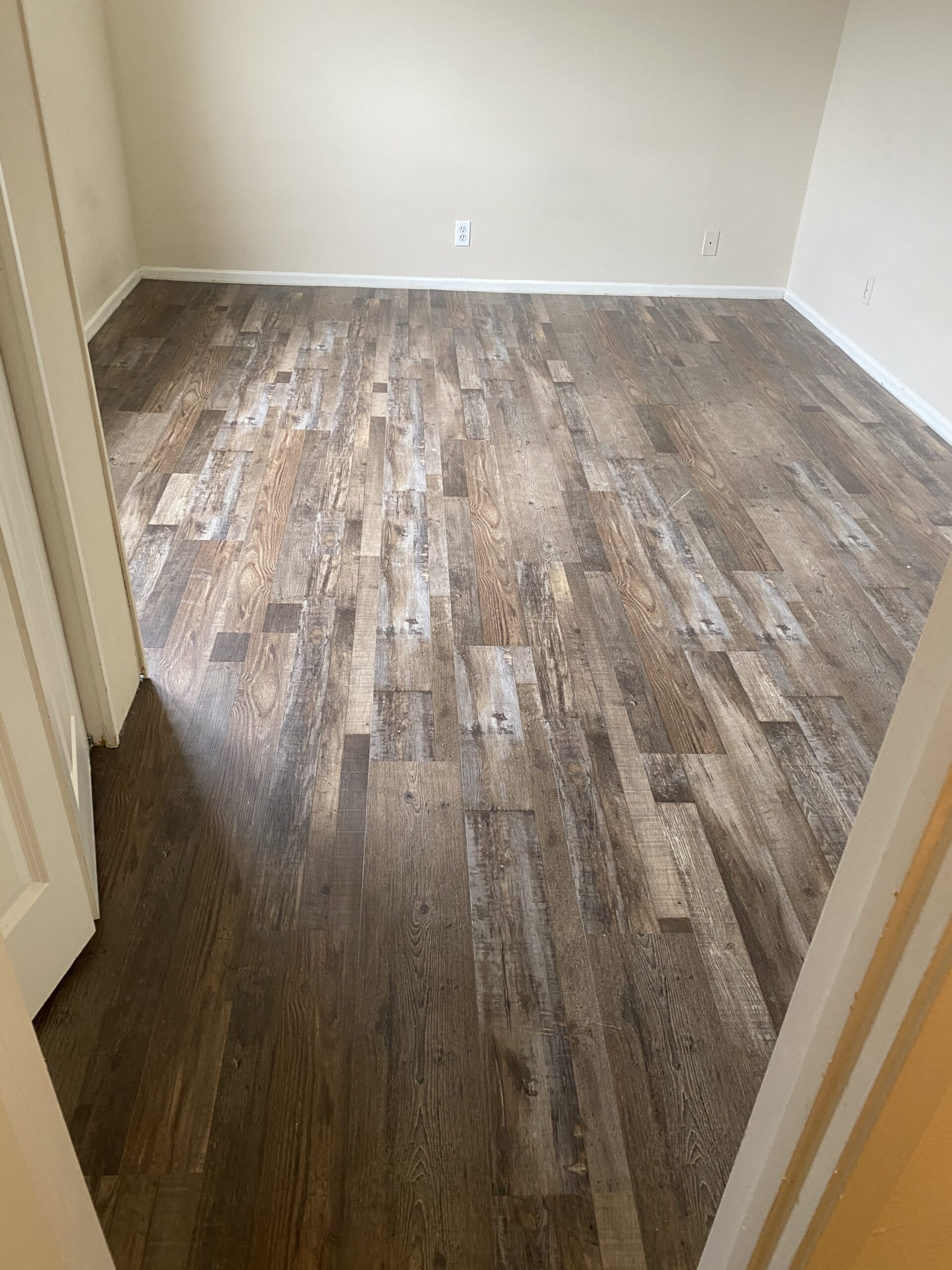 Laminate Floor Installation in Room.