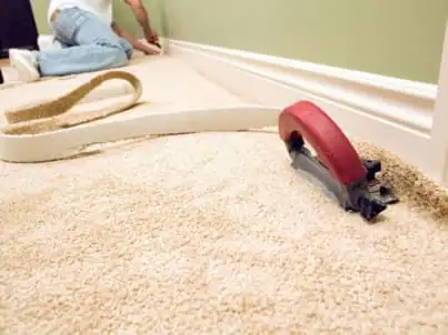 Professional carpet installation in a Los Angeles bedroom, creating a soft and comfortable living space.