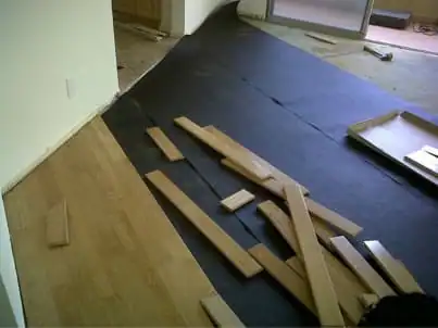 Solid hardwood floor installation services provided in a Los Angeles residential property.